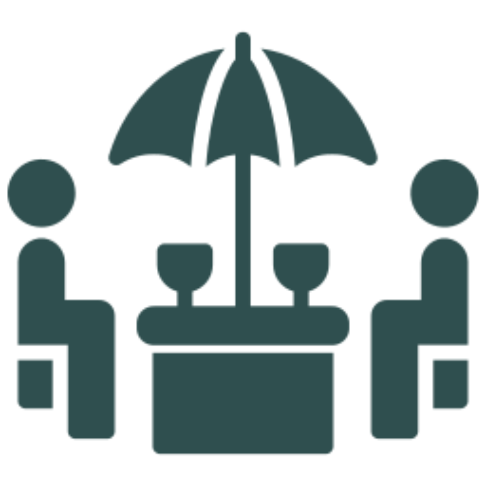Table with an umbrella and two people sitting at it, surrounded by glasses, suggesting a summer vacation