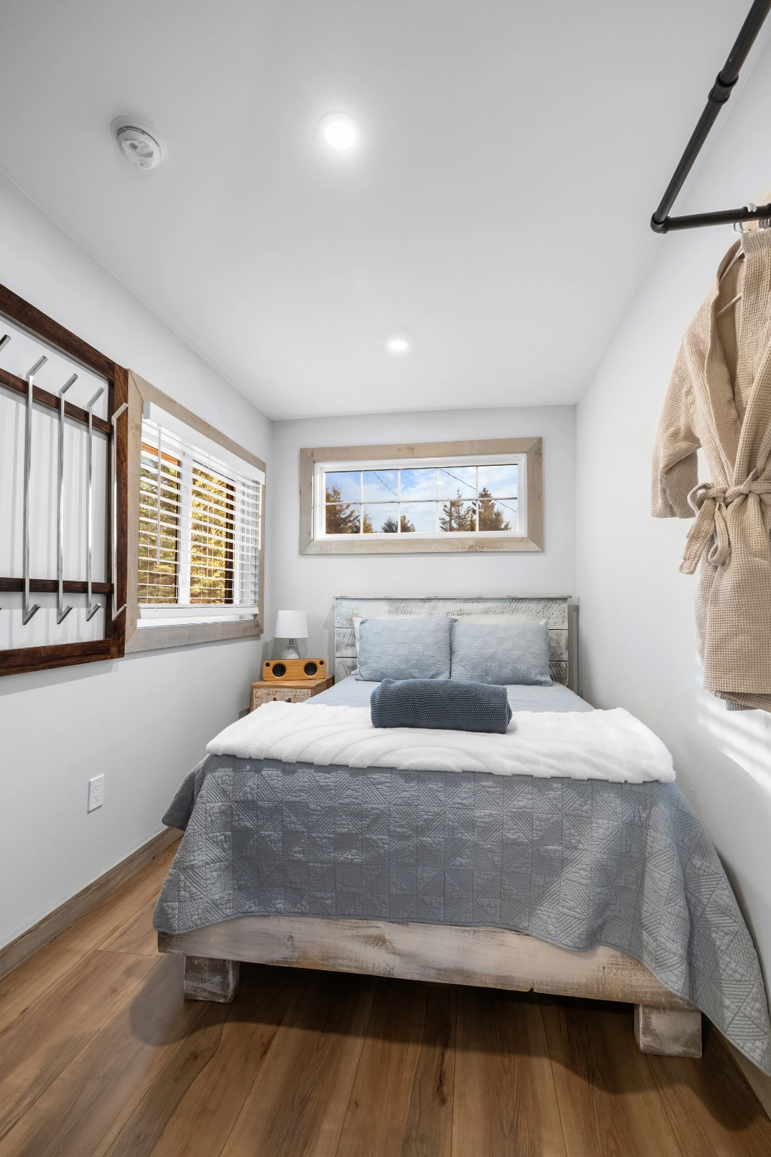 Modern bedroom with blue and white bedding