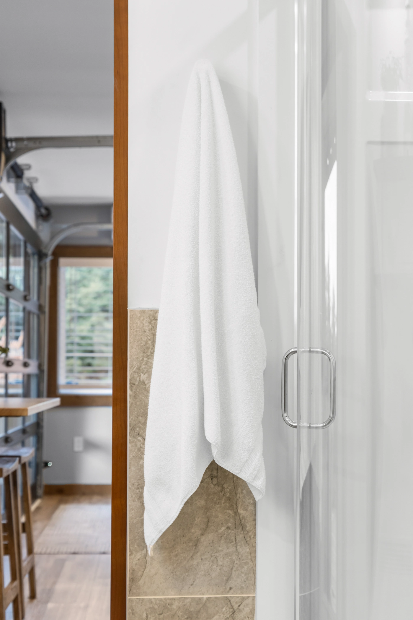 Clean towel in bright, modern bathroom
