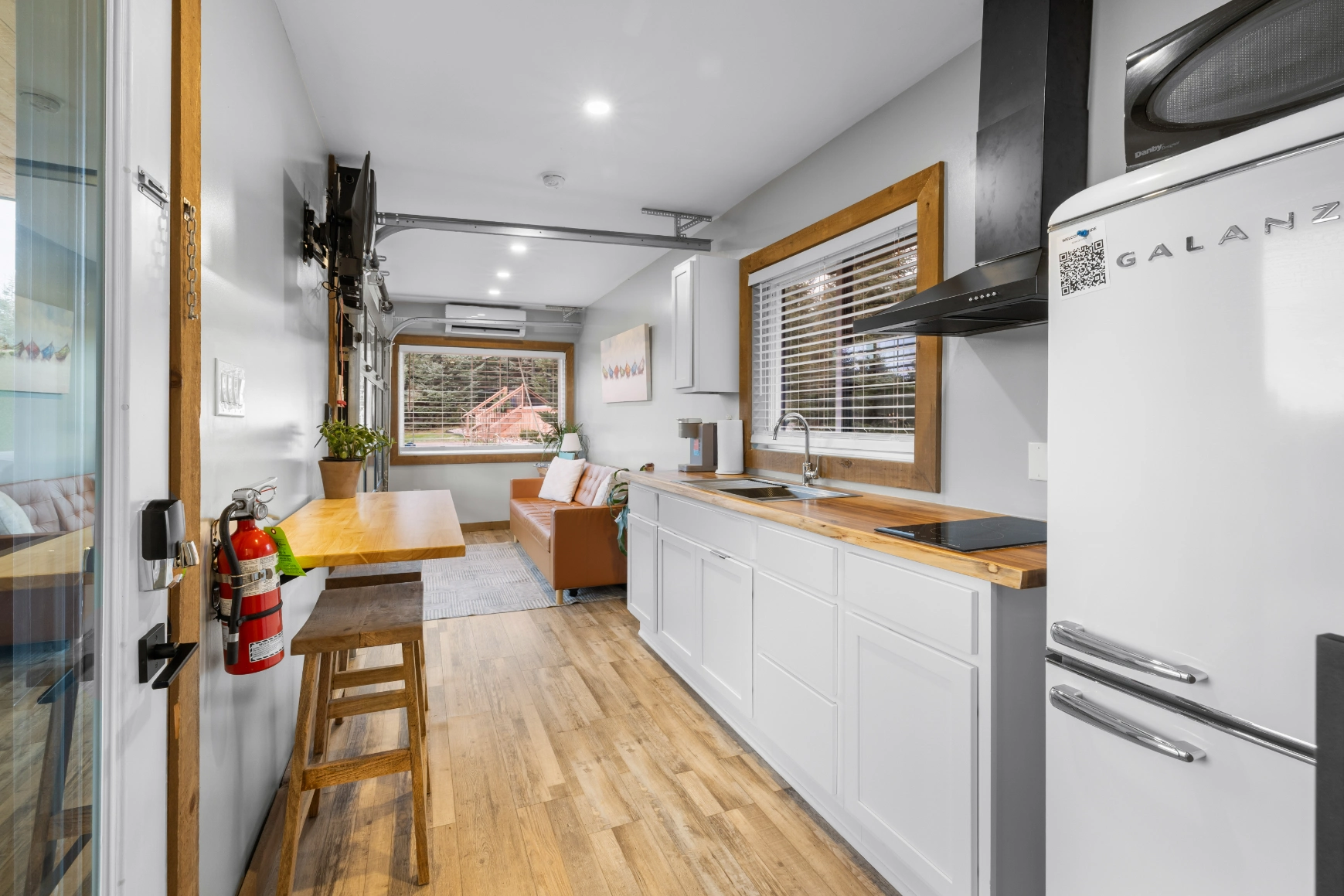 Modern tiny house kitchen and living room