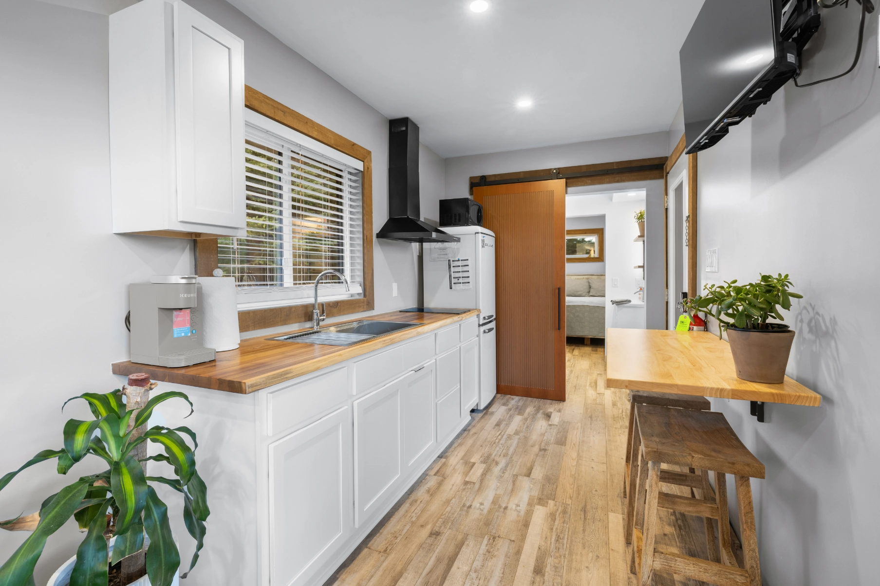 Modern kitchen with wood counter