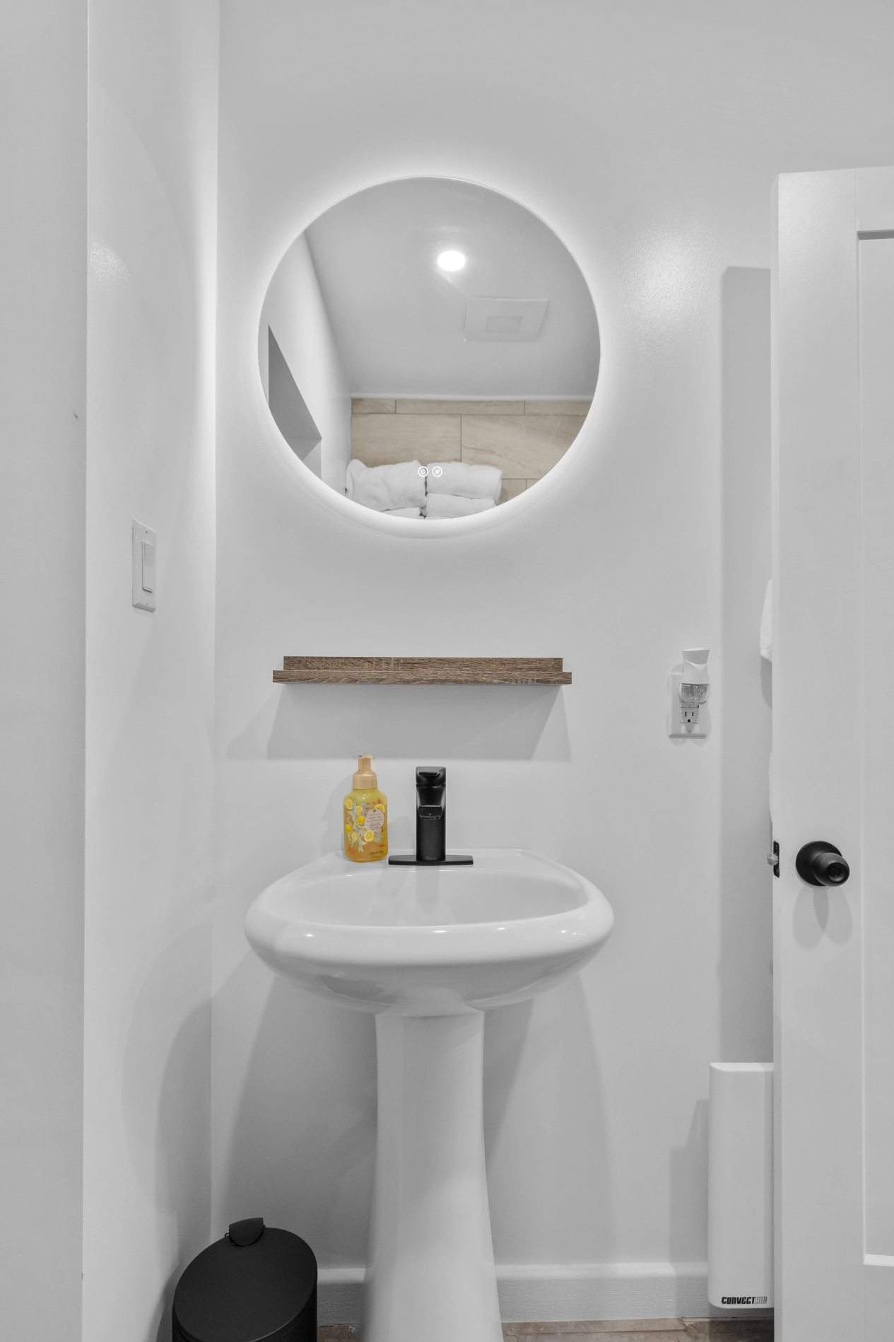 Bright white bathroom with sleek design elements