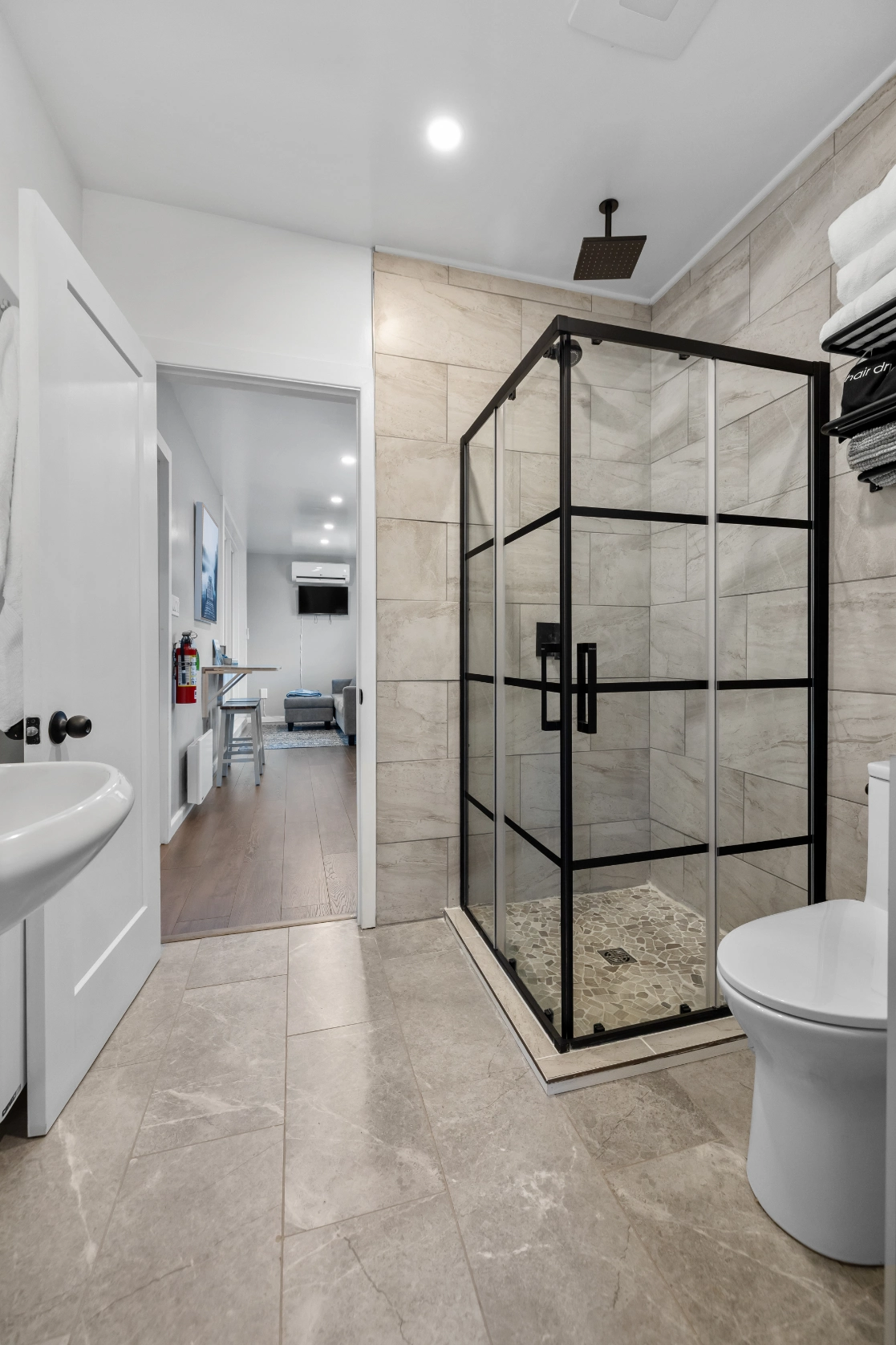 Contemporary bathroom with shower, toilet, and sink