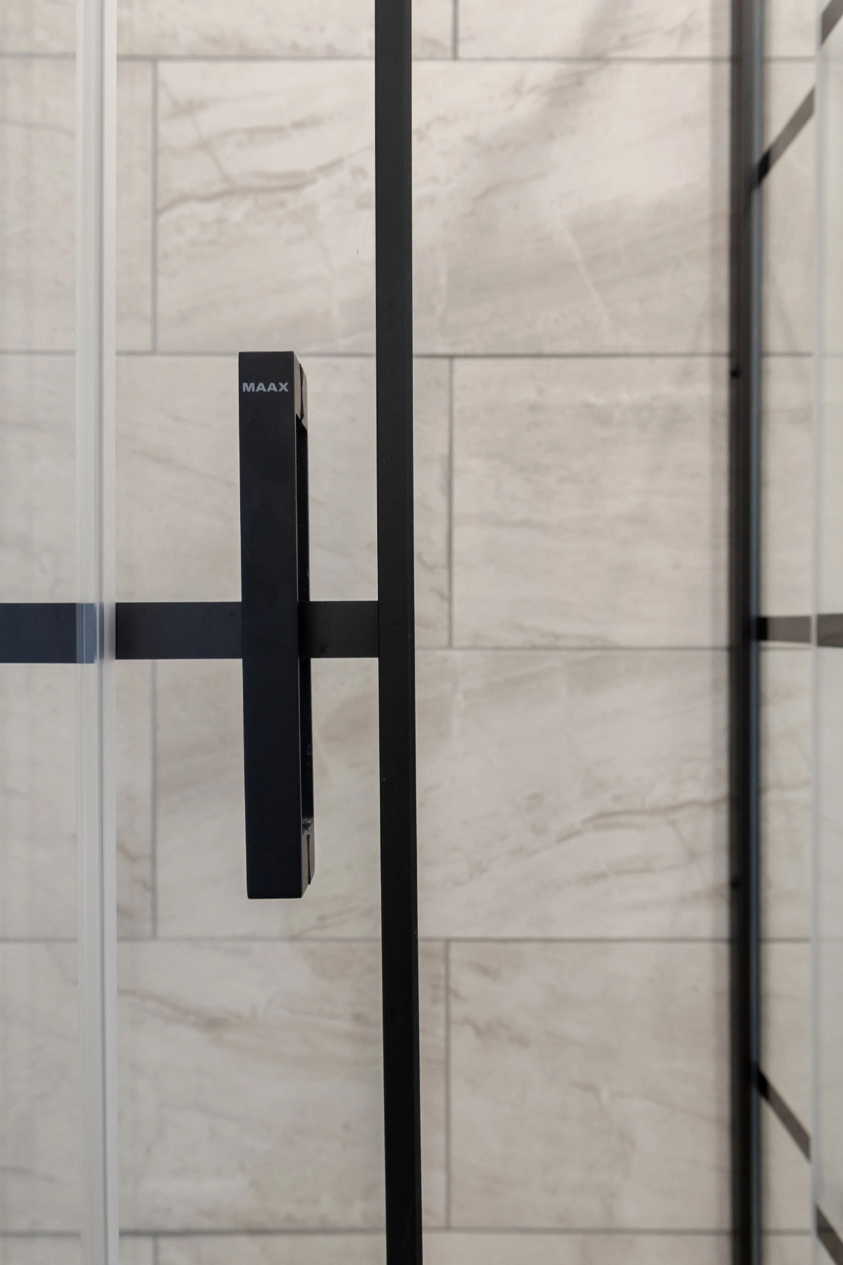 Modern shower door with black frame