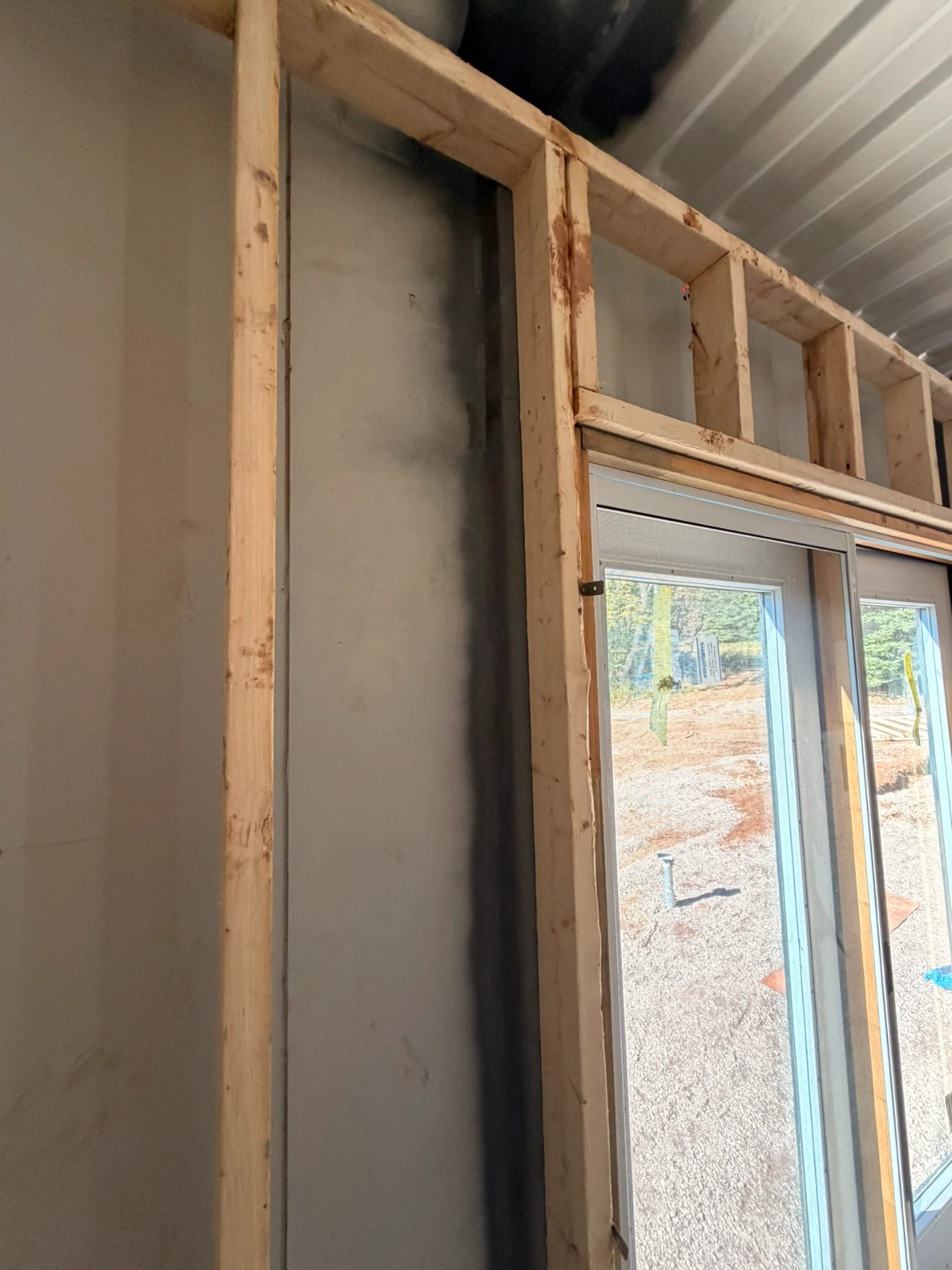 Interior view of wall framing and window